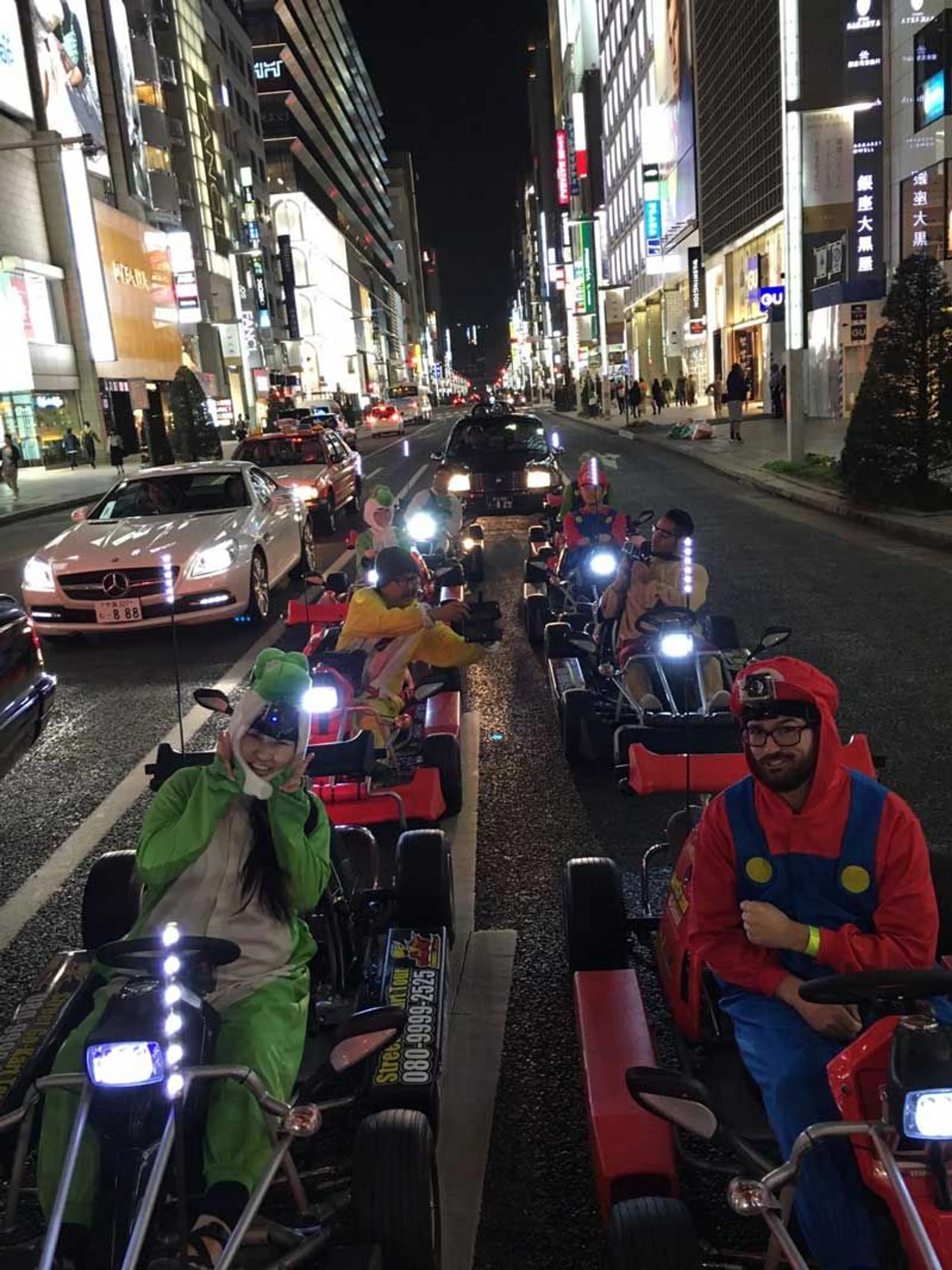 Group shot of the drivers in the middle of Ginza